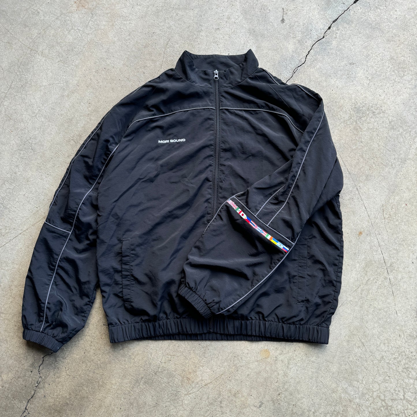 Drop 000 - Global Stepper || Tracksuit Jacket